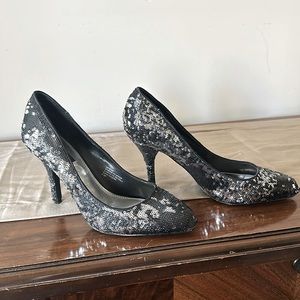 Silver and black sequent heels